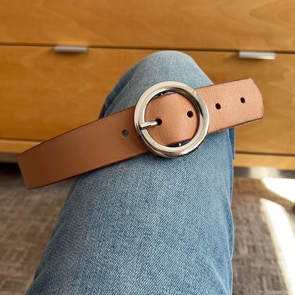 Dressy tan belt with round silver buckle